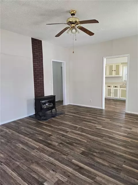 Living - 301 E 6th Ave, Caney, KS 67333 photo 3 of 5