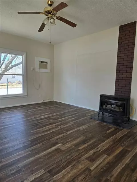 Living - 301 E 6th Ave, Caney, KS 67333 photo 1 of 5