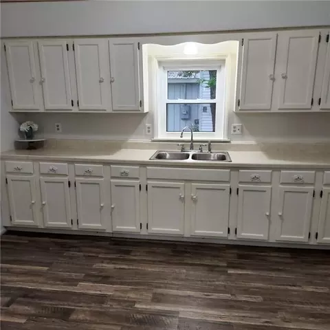 Kitchen - 301 E 6th Ave, Caney, KS 67333 photo 1 of 2