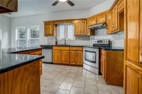 Kitchen - 728 S Kisner Dr, Independence, MO 64056 photo 1 of 3