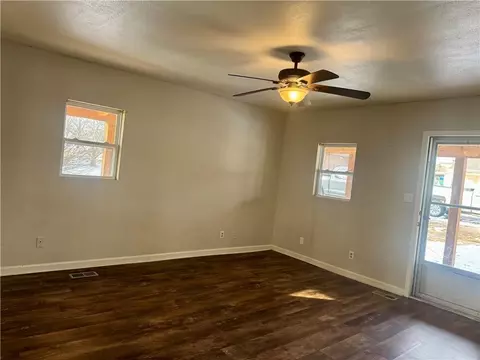 Living - 214 E Cass, Drexel, MO 64742 photo 2 of 3