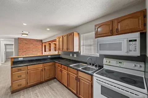 Kitchen - 612 Christopher St, Warrensburg, MO 64093 photo 2 of 2