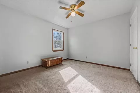 Bedroom - 307 E Gore Rd, Raymore, MO 64083 photo 2 of 3