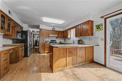 Kitchen - 307 E Gore Rd, Raymore, MO 64083 photo 4 of 4