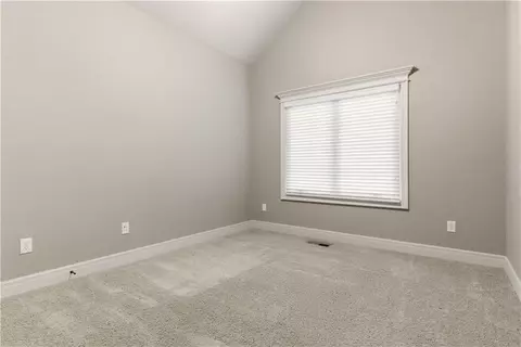 Bedroom - 1559 Brompton Ln, Raymore, MO 64083 photo 4 of 11