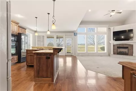 Living - 1559 Brompton Ln, Raymore, MO 64083 photo 8 of 12