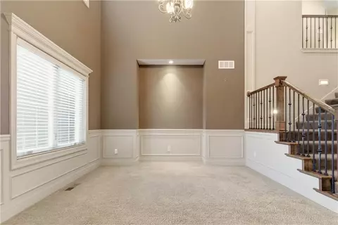 Living - 1559 Brompton Ln, Raymore, MO 64083 photo 2 of 12