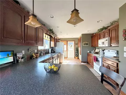 Kitchen - 300 E 2nd St, Norborne, MO 64668 photo 2 of 4