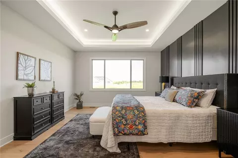 Bedroom - 520 Bentwater Dr, Raymore, MO 64083 photo 3 of 8