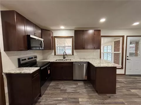 Kitchen - 1004 3rd Ter, Lees Summit, MO 64063 photo 2 of 2