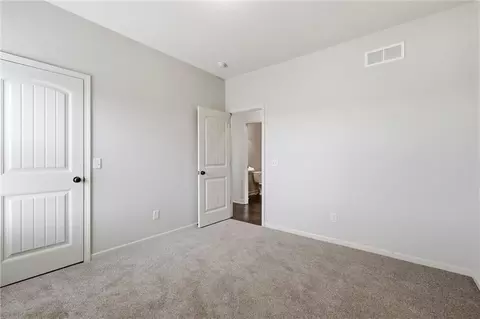 Bedroom - 1217 Hampton Dr, Raymore, MO 64083 photo 9 of 9