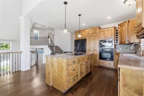 Kitchen - 1217 Hampton Dr, Raymore, MO 64083 photo 2 of 3