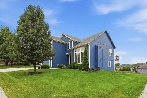 Exterior - 1217 Hampton Dr, Raymore, MO 64083 photo 6 of 12