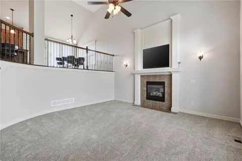 Living - 1217 Hampton Dr, Raymore, MO 64083 photo 3 of 4