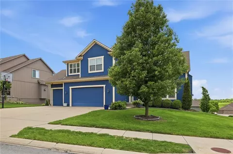 Exterior - 1217 Hampton Dr, Raymore, MO 64083 photo 4 of 5