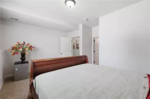Bedroom - 1217 Hampton Dr, Raymore, MO 64083 photo 7 of 9