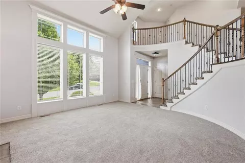 Living - 1217 Hampton Dr, Raymore, MO 64083 photo 1 of 4