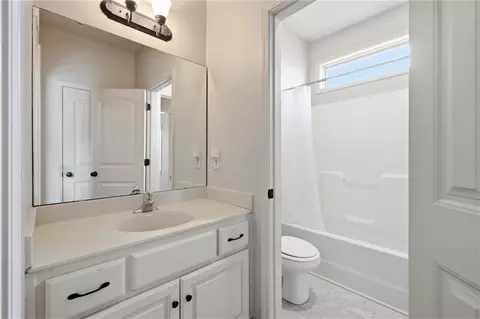 Bath - 1217 Hampton Dr, Raymore, MO 64083 photo 4 of 5