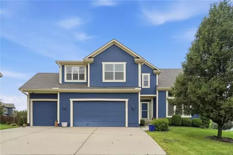 Exterior - 1217 Hampton Dr, Raymore, MO 64083 photo 3 of 12