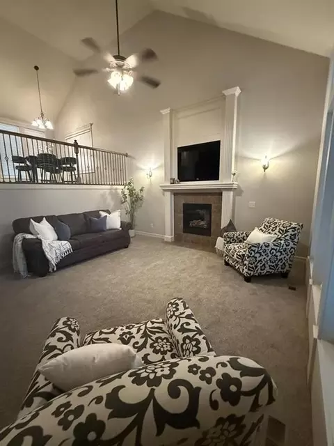 Living - 1217 Hampton Dr, Raymore, MO 64083 photo 1 of 5