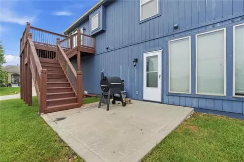 Exterior - 1217 Hampton Dr, Raymore, MO 64083 photo 10 of 12