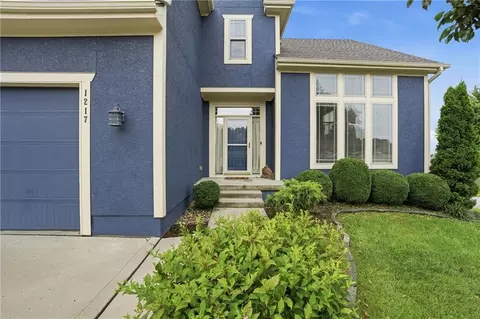Exterior - 1217 Hampton Dr, Raymore, MO 64083 photo 5 of 12
