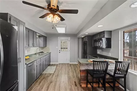 Kitchen - 1492 SW Hook Rd, Lees Summit, MO 64082 photo 2 of 4