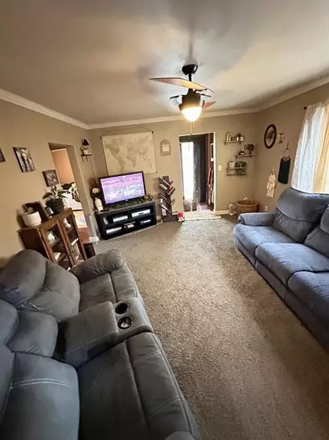 Living - 205 E Maple St, Liberal, MO 64762 photo 1 of 2