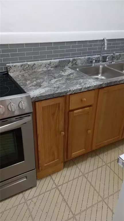 Kitchen - 2511-2517 Mitchell Ave, Saint Joseph, MO 64507 photo 2 of 3