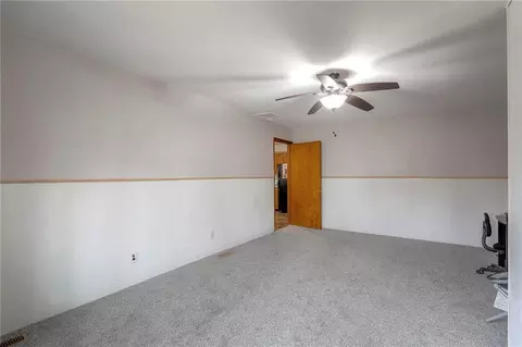 Bedroom - 406 E Washington St, Windsor, MO 65360 photo 2 of 9