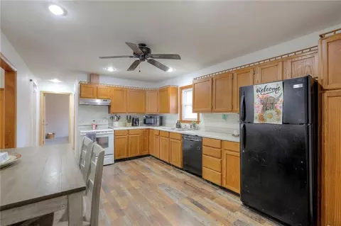 Kitchen - 406 E Washington St, Windsor, MO 65360 photo 2 of 3