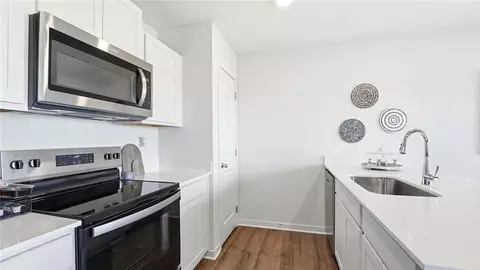 Kitchen - 717 Fallen Leaf Dr, Belton, MO 64012 photo 2 of 3