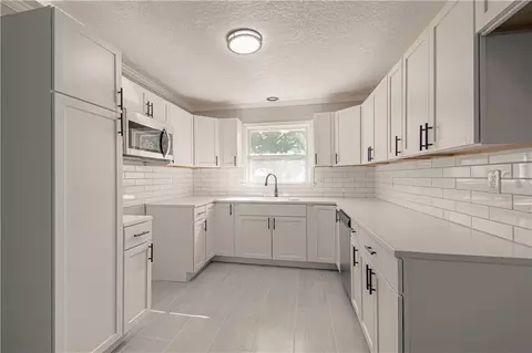 Kitchen - 8512 E 85th St, Raytown, MO 64138 photo 2 of 2
