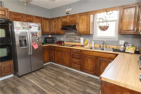 Kitchen - 703 E 4th St, Cherryvale, KS 67335 photo 1 of 3