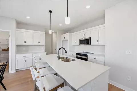 Kitchen - 1206 Royal Arch Trl, Raymore, MO 64083 photo 2 of 3