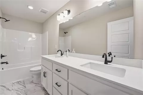 Bath - 1206 Royal Arch Trl, Raymore, MO 64083 photo 2 of 2