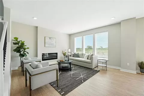 Living - 1201 Sendera Trl, Raymore, MO 64083 photo 2 of 3