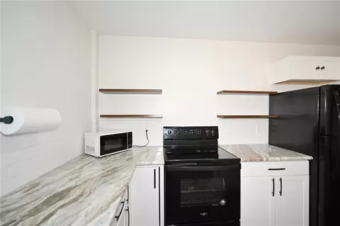 Kitchen - 30704 Outerbelt Rd, Lees Summit, MO 64086 photo 2 of 3
