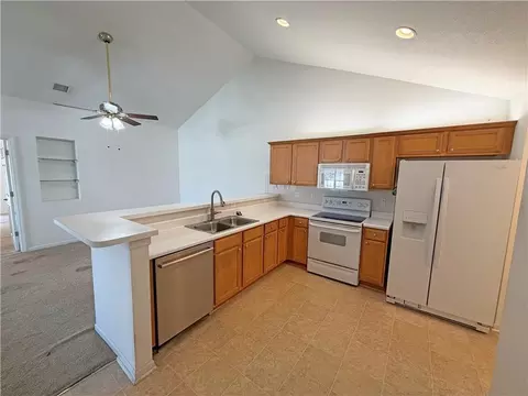 Kitchen - 823 NE Devon Dr, Lees Summit, MO 64064 photo 1 of 2