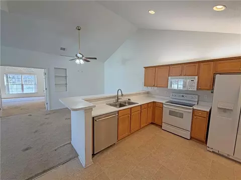 Kitchen - 823 NE Devon Dr, Lees Summit, MO 64064 photo 2 of 2