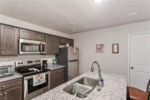 Kitchen - 2104 Crestview Pl, Raymore, MO 64083 photo 3 of 4