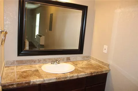 Bath - 405 E Jackson St, Pittsburg, KS 66762 photo 3 of 5