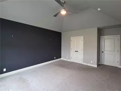 Bedroom - 1205 Hampton Dr, Raymore, MO 64083 photo 5 of 8