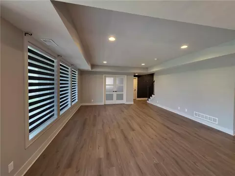 Living - 1205 Hampton Dr, Raymore, MO 64083 photo 4 of 4