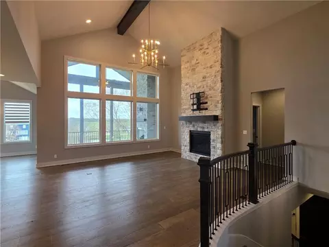 Living - 1205 Hampton Dr, Raymore, MO 64083 photo 2 of 4