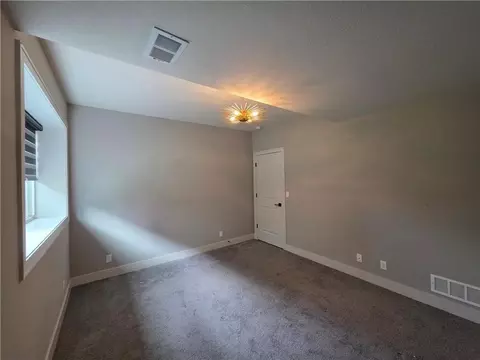 Bedroom - 1205 Hampton Dr, Raymore, MO 64083 photo 8 of 8