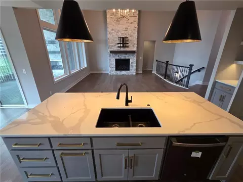 Kitchen - 1205 Hampton Dr, Raymore, MO 64083 photo 3 of 4