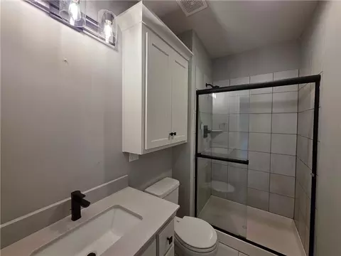 Bath - 1205 Hampton Dr, Raymore, MO 64083 photo 7 of 7
