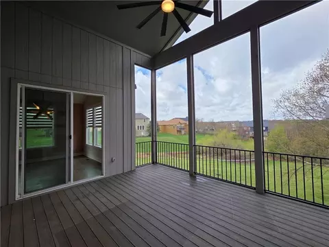 Exterior - 1205 Hampton Dr, Raymore, MO 64083 photo 4 of 8