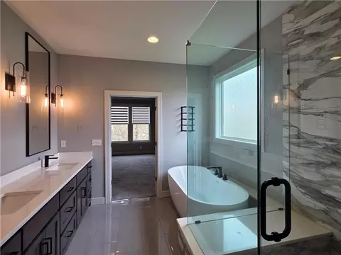 Bath - 1205 Hampton Dr, Raymore, MO 64083 photo 2 of 7